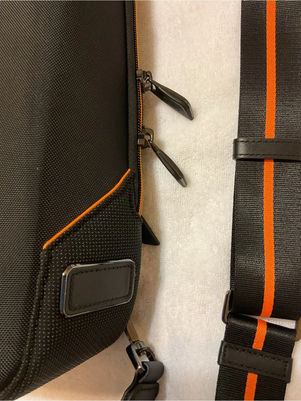 Tumi McLaren Black Sling Belt Bag with Orange Stripe